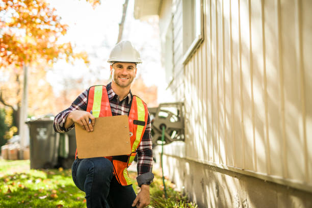 istock inspector or engineer is checking the building structure and house. After the renovate is complete 2185402146