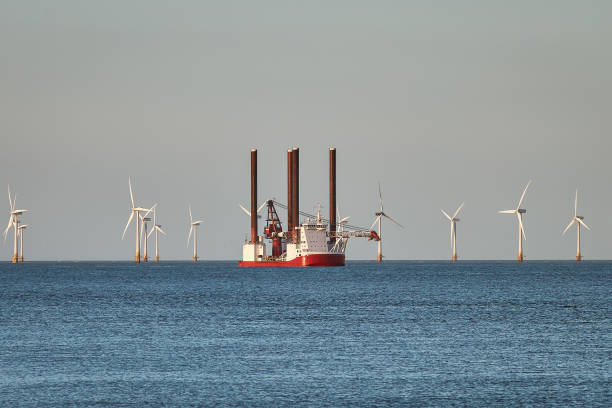 istock Jack up wind turbines installation vessel in the sea. 2185404205
