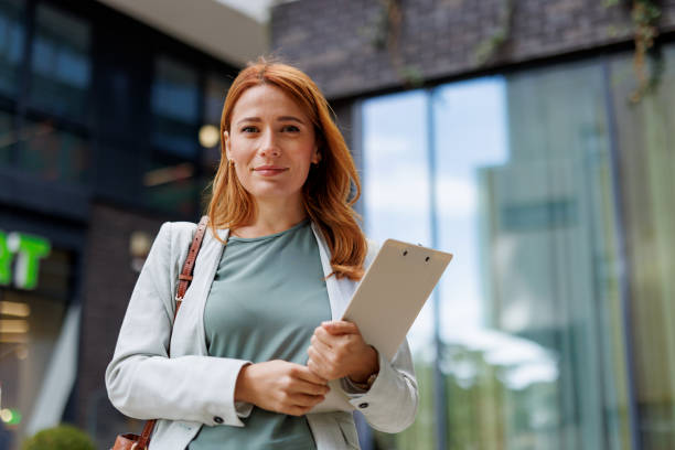 istock Modern professional woman confidently holding her devices 2185404707