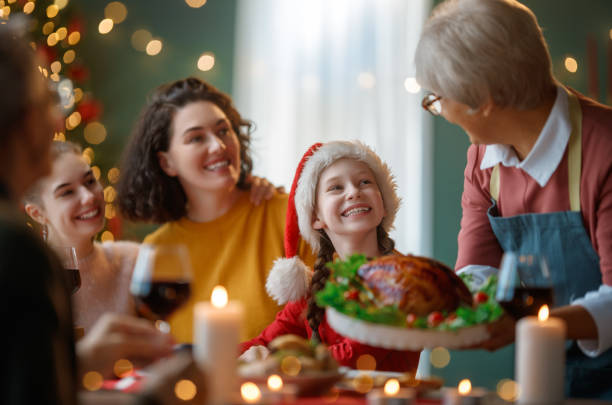 istock family celebrating Christmas 2185405317