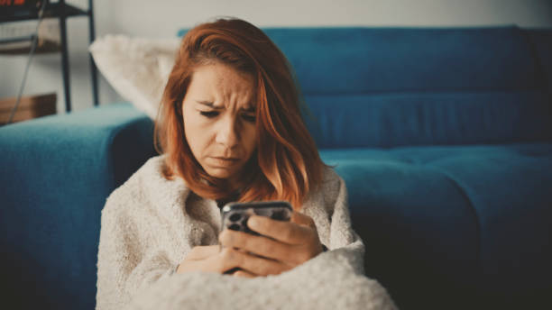 Troubled Caucasian Woman Seeking Solace in Technology