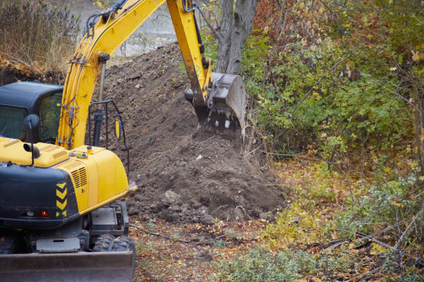 istock Machinery at the construction site: the excavator digs soil for foundation work. 2185407964
