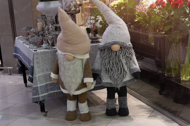 Grey Christmas dwarf toys for decorations displayed in shop. Christmas decorations