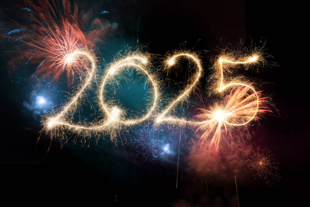 istock Sparkler Happy New Year 2025 with fireworks 2185412254