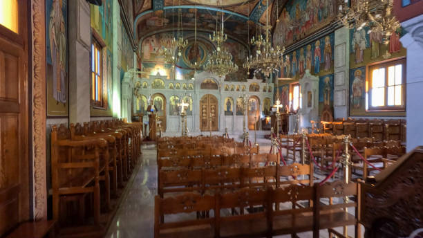 On the island of Tinos, in the Cyclades, in the heart of the Aegean Sea and at the foot of mount exobourgo, view of the golden dome of an orthodox church near the village of Tripotamos.