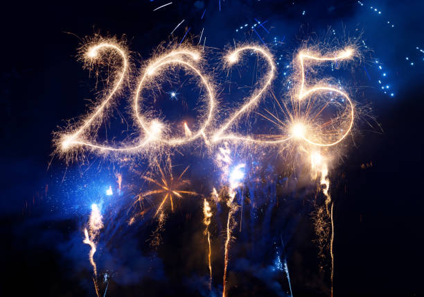 istock Sparkler Happy New Year 2025 with fireworks 2185413055