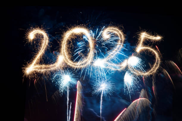 istock Sparkler Happy New Year 2025 with fireworks 2185413347