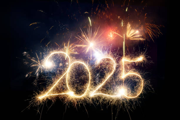 istock Sparkler Happy New Year 2025 with fireworks 2185413591