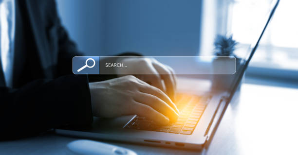 istock Person clicking internet search page on touch screen. Searching information on internet. SEO searching. 2185417062