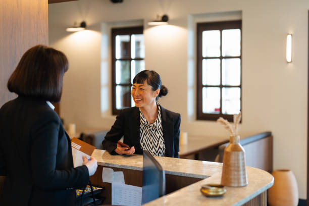 istock Business traveler checking in 2185417090