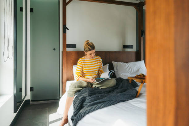 istock Waking up in a hotel room 2185417110