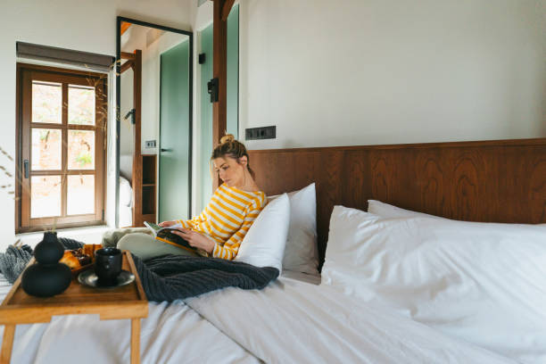 istock Waking up in a hotel room 2185417132