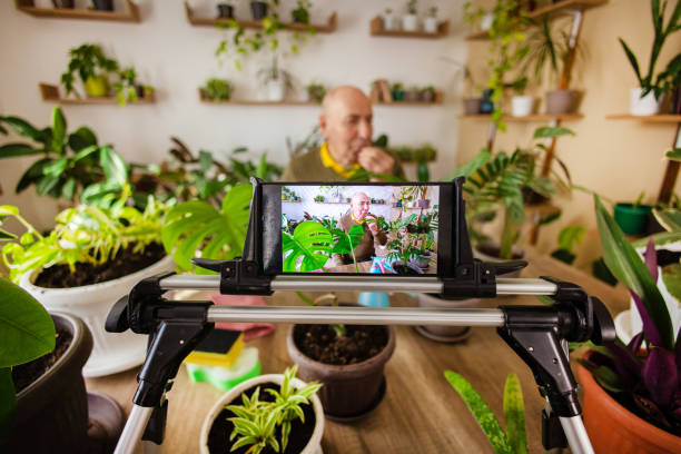 istock Retired Man Vlogging on Houseplants 2185418514