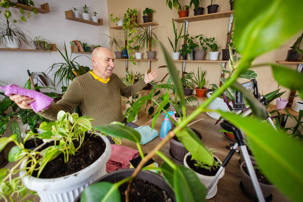 Senior Man Recording Plant Care Tips