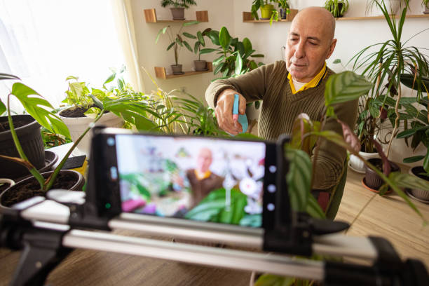istock Retired Man Vlogging on His Plants 2185418590