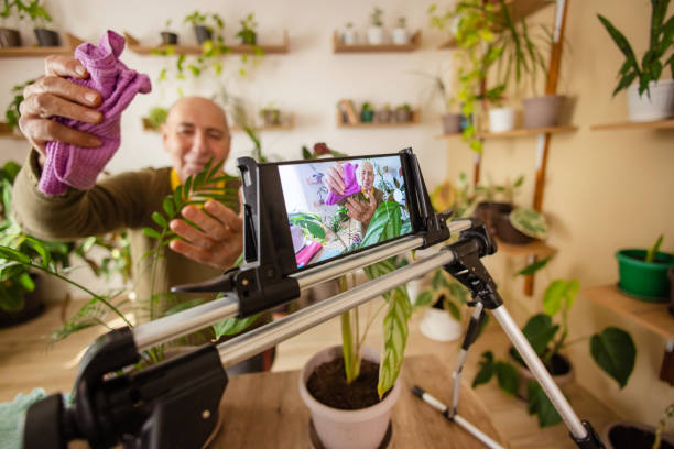 istock Older Man Discussing Indoor Plants 2185418646