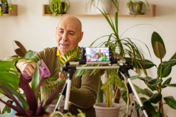 istock Retired Man Filming His Plant Collection 2185418647