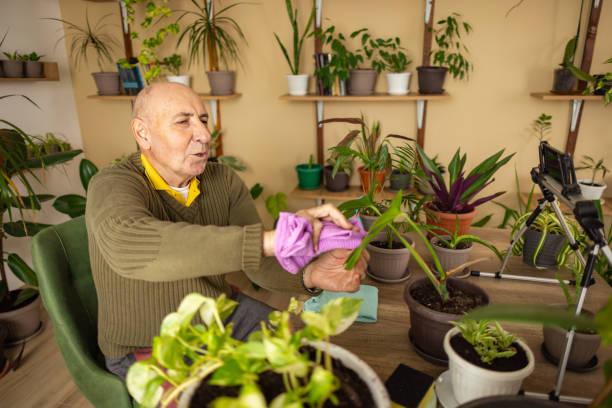 istock Retired Man Educating About Indoor Plants 2185418793