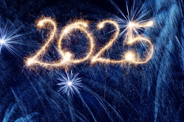 istock Sparkler Happy New Year 2025 with fireworks 2185418867
