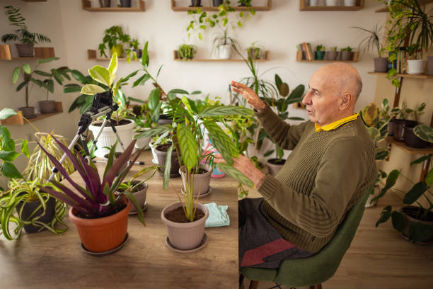 istock Senior Man Talks About Plant Care 2185418890