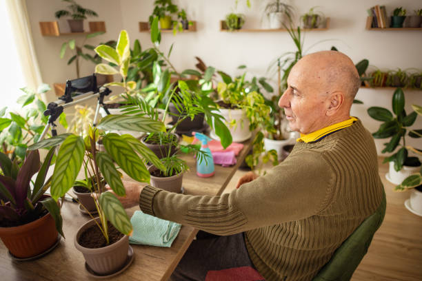 istock Senior Man Teaching About Plant Care 2185418896