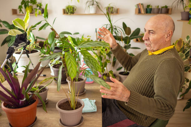 istock Man Talks About Plant Care 2185418897