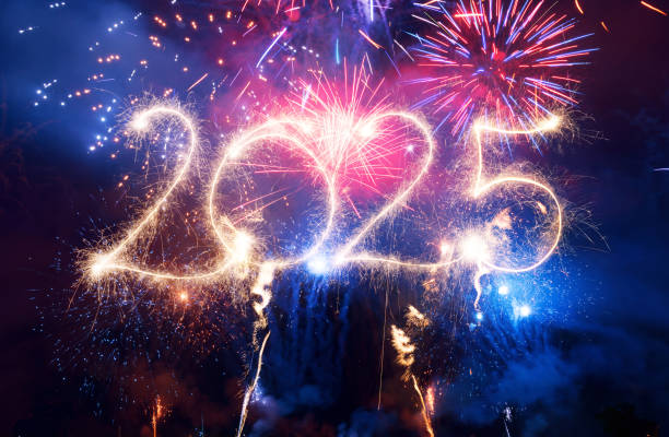 istock Sparkler Happy New Year 2025 with fireworks 2185419041