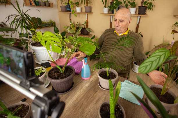 istock Elderly Man Sharing Plant Care Advice 2185419073