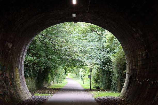 istock View through a tunnel on a former railway line, now a walking and cycle path 2185420232