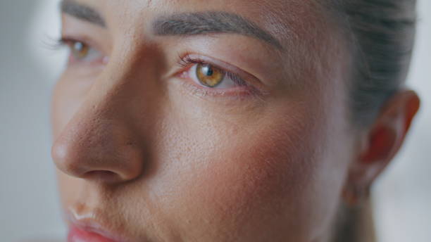 istock Relaxed face woman looking straight making breathing exercise at studio closeup 2185422125