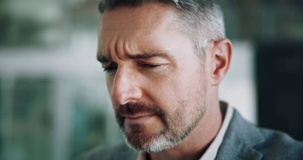 istock Doubt, thinking and mature man in office with ideas, business plan and brainstorming for solution. Frustrated, confused and face of businessman with brain fog, problem solving and risk management 2185422935
