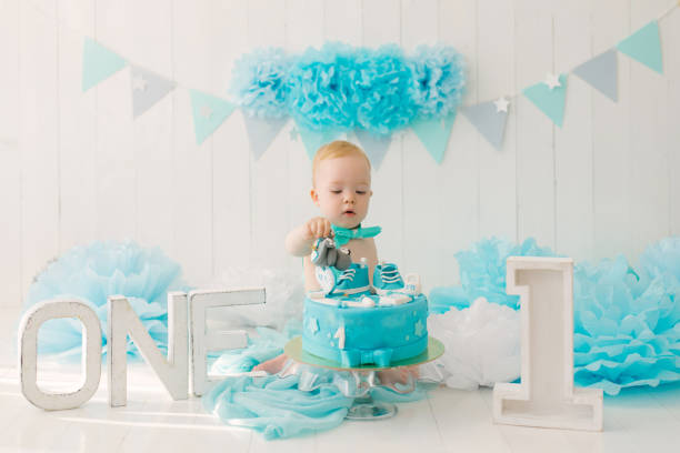 istock A one-year-old boy tries his first birthday cake 2185425482