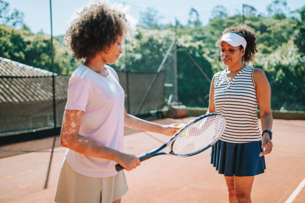istock Tennis teacher for children 2185425659