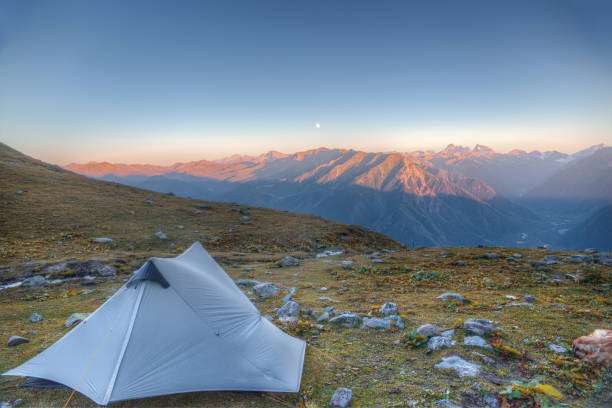 Tourist tent set up in the mountains. Beautiful view of the mountains.