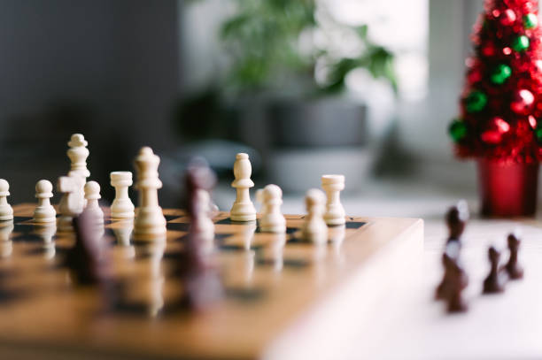 istock A wooden chess board with pieces on it 2185428125
