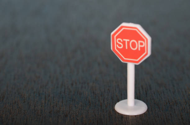 istock Stop Sign Symbol - A Universal Warning of Caution and Safety 2185429586
