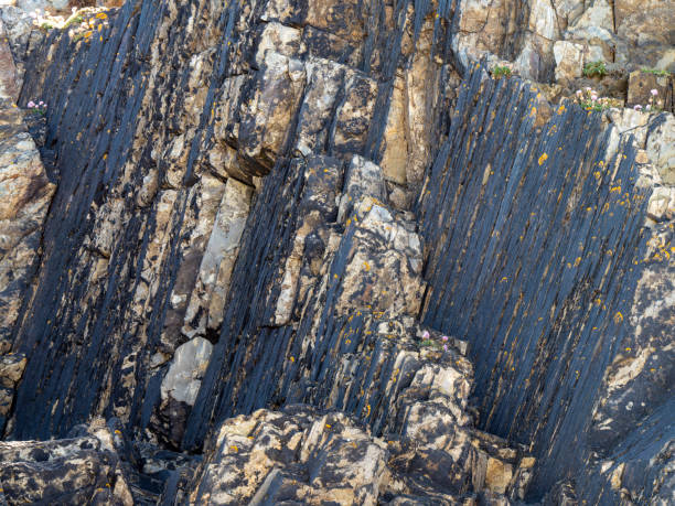 istock A variety of geological strata as a background. 2185429961