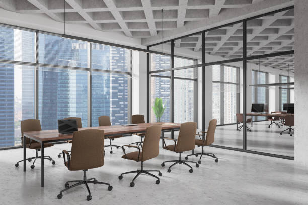 istock Stylish office interior with coworking and meeting zone, panoramic window 2185431808