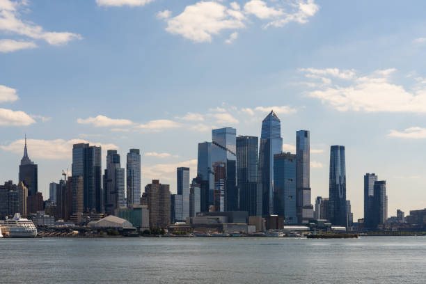 istock Manhattan skyline with modern skyscrapers and waterfront seen from Hudson River. 2185431872