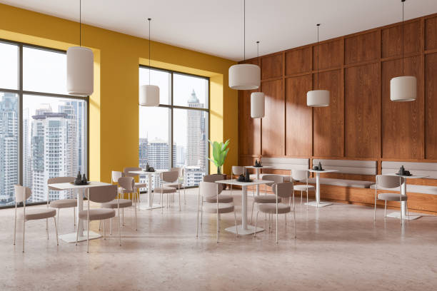 istock Cozy restaurant interior with chairs and tables in row, eating space and window 2185431985
