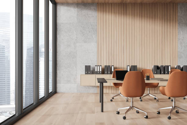 istock Stylish office interior with meeting board and chairs, panoramic window 2185432277