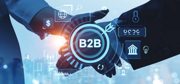 istock Business handshake with B2B text and icons on a blue background. 2185432318