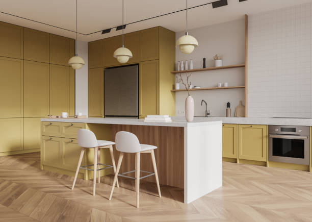 istock Modern kitchen with mustard cabinetry and wooden accents. 3D Rendering 2185433584