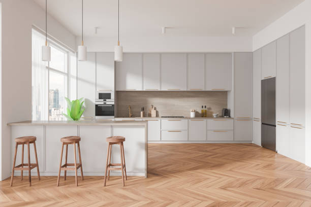 istock Luxury home kitchen interior with bar island and cabinet, panoramic window 2185433646
