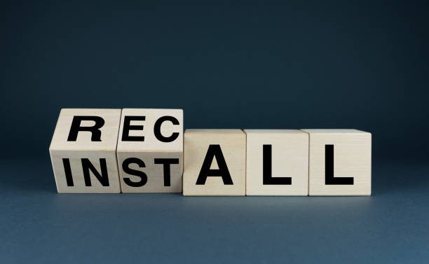 istock Wooden blocks with the words INSTALL and RECALL 2185438210