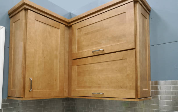 istock Wood kitchen cabinet with door closed 2185439440