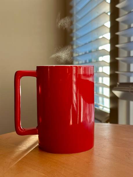 istock Hot Steamy Morning Coffee on Relaxing Sunny Day 2185439485