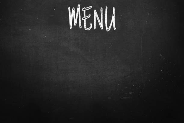 Business strategies and goals or New Year and Merry Christmas written on a school chalkboard or blackboard.