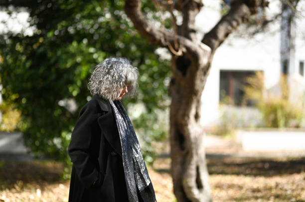 istock Senior woman in winter coat. 2185440625