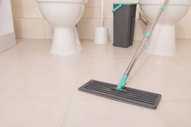 istock Cleaning Floor in Bathroom, WC. Mop close-up. Ceramic Tile floor 2185442875